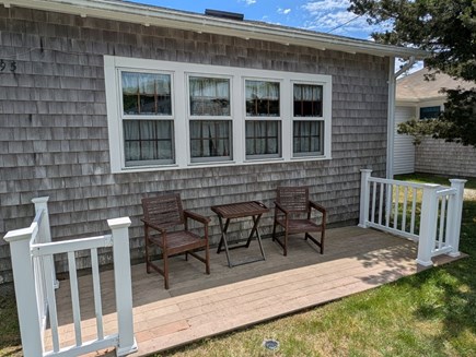 South Yarmouth Cape Cod vacation rental - Side patio, great for coffee and people watching