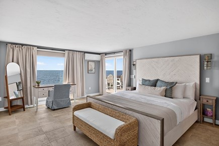 Harwichport Cape Cod vacation rental - Primary bedroom with king bed and ocean views on the first floor<br/>
