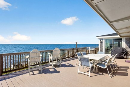 Harwichport Cape Cod vacation rental - Deck dining area with ocean views and private beach!<br/>