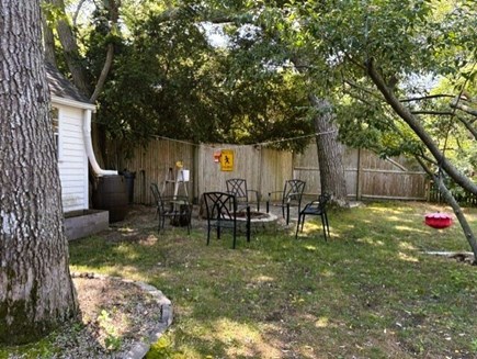 Eastham Cape Cod vacation rental - Side Yard w Fire Pit