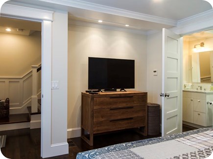 Provincetown Cape Cod vacation rental - Downstairs queen bedroom with direct access to full bath<br/>