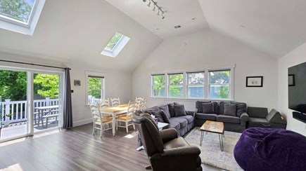 Wellfleet Village Cape Cod vacation rental - Open living and dining area with vaulted ceilings and skylights