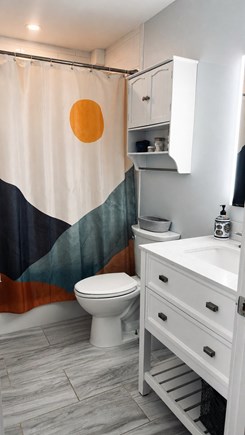 Wellfleet Village Cape Cod vacation rental - Bathroom in the hallway with tub