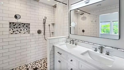 Wellfleet Village Cape Cod vacation rental - Primary ensuite with double vanity & toilet closet.