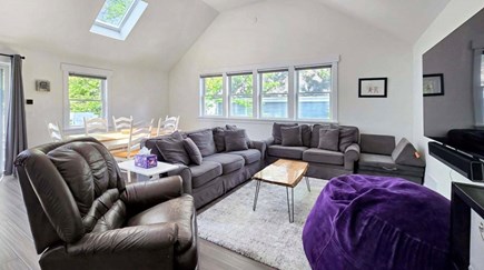 Wellfleet Village Cape Cod vacation rental - Spacious living area, sectional seating, dining table