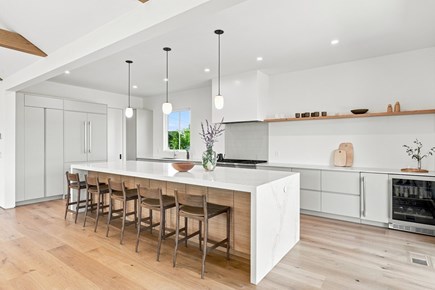 Orleans, Nauset Tide Cape Cod vacation rental - Modern kitchen with oak stools