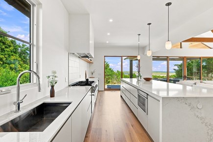 Orleans, Nauset Tide Cape Cod vacation rental - Wide island kitchen with scenic outlook