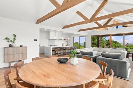 Orleans, Nauset Tide Cape Cod vacation rental - Open living and dining space with vaulted beams and a water view.