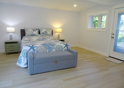 Plymouth MA vacation rental - Main floor queen bedroom with door to back patio