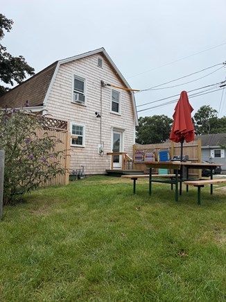 Harwich Port Cape Cod vacation rental - Backyard-bigger than most in the Campgrounds. X-Long picnic table