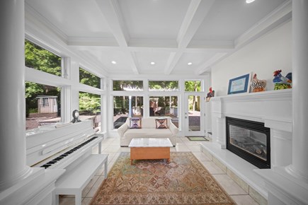 Sagamore Beach Cape Cod vacation rental - Sunny living room with piano and fireplace