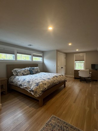 N Falmouth Cape Cod vacation rental - King bedroom with a pullout full-sized sofa bed and desk