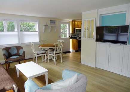 Eastham (Bay side) Cape Cod vacation rental - Living room offers dining area, opens to kitchen 