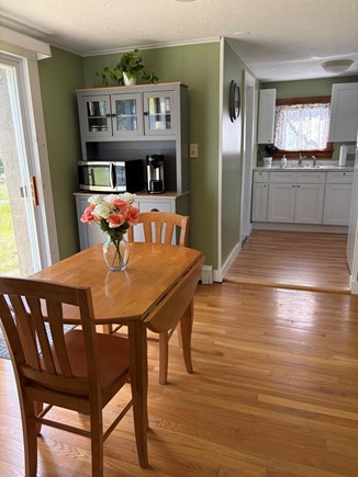 Wareham MA vacation rental - Cozy eat in dining with slider to back yard/grill