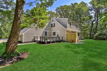 Brewster Cape Cod vacation rental - Large backyard with outdoor shower and firepit (not pictured)