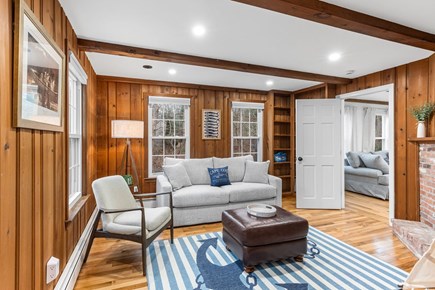 Brewster Cape Cod vacation rental - Second living room with pullout sofa, fireplace and desk