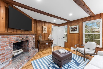 Brewster Cape Cod vacation rental - Second living room with pullout sofa, fireplace and desk