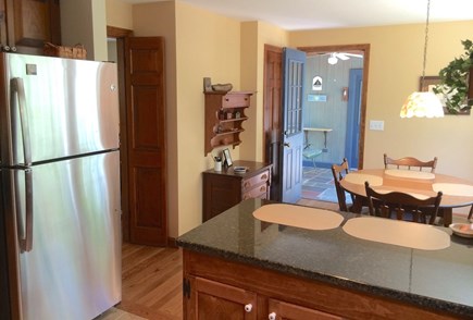 Orleans Cape Cod vacation rental - Kitchen looking to kitchen table and breezeway