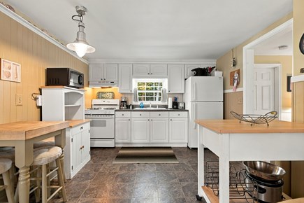 West Yarmouth Cape Cod vacation rental - Kitchen with breakfast bar at left