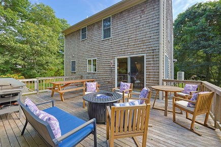 Brewster Cape Cod vacation rental - Deck with gas fire pit and seating
