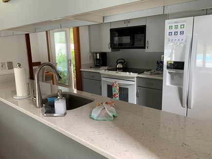 New Seabury Cape Cod vacation rental - View to encompass the galley style kitchen