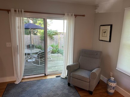 Cotuit Cape Cod vacation rental - Seating Area in Great Room by Sliding Glass Doors to Patio