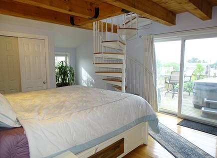 Sandwich - Town Neck Area Cape Cod vacation rental - Master king bedroom with slider to hot tub & upper deck