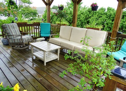 Sandwich - Town Neck Area Cape Cod vacation rental - Deck area with plenty of seating, flowers