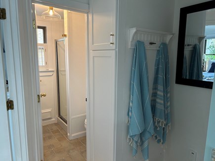 Provincetown Cape Cod vacation rental - Bathroom Cabinet with Towels and Beach Chairs
