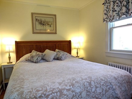 West Yarmouth Cape Cod vacation rental - Breezy MBR or air conditioning - Queen. Morning sun, garden view.