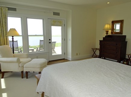 Wellfleet Cape Cod vacation rental - Master bedroom with ensuite 3 piece bath and door to a deck