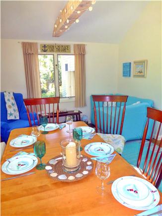 North Eastham - Bayside Cape Cod vacation rental - Dining area with bench seating for crowds! Reading nook is nearby