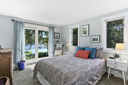 Chatham Cape Cod vacation rental - First floor guest bedroom with water view/sliders to deck