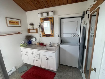 Wellfleet Harbor & Beach Cape Cod vacation rental - Large decorated bathroom with washer, dryer, iron & Ironing board