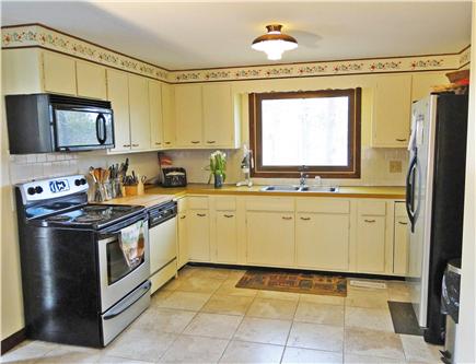 So. Harwich/So. Chatham Cape Cod vacation rental - Dining room opens to kitchen (new stove, fridge, and microwave)