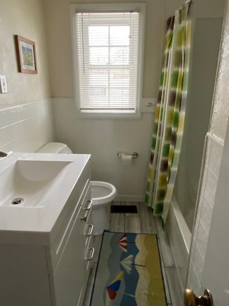 Dennis Cape Cod vacation rental - Main bath, new fixtures, vanity and toilet