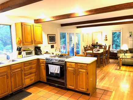 East Orleans Cape Cod vacation rental - Kitchen to D/R and patio door
