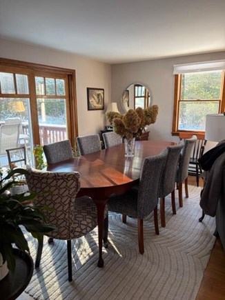 Eastham Cape Cod vacation rental - Dining room with deck beyond the sliding French Door.<br/>