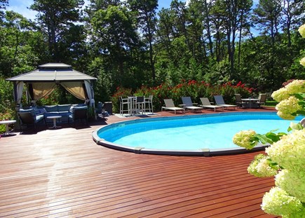 Eastham Cape Cod vacation rental - Pool area offers games, shaded gazebo and many lounge chairs 