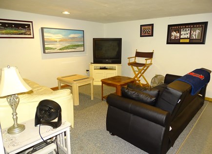 West Yarmouth Cape Cod vacation rental - Extra rec room in basement with TV, dining area and desk