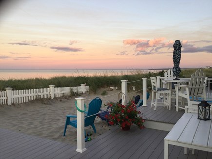 Sagamore Beach, Sandwich  Cape Cod vacation rental - Oversized wrap around deck with ample table/chairs and sand area