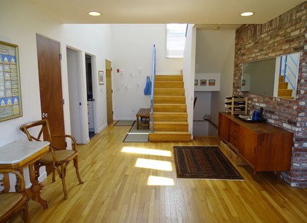Wellfleet Harbor, on the Bluff Cape Cod vacation rental - Entrance hall, showing stairs up and down