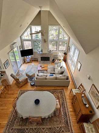 Wellfleet Cape Cod vacation rental - Living areas from stairs, leading to loft and second sun deck