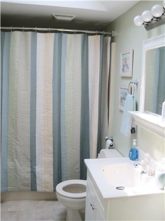 Falmouth Cape Cod vacation rental - Second-floor bathroom with rain showerhead and skylight