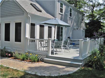 Falmouth Cape Cod vacation rental - Deck with outdoor shower, gas grill & 10-person picnic table