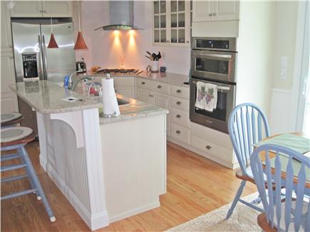 Falmouth Cape Cod vacation rental - Center island kitchen with second refrigerator in basement