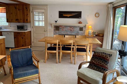 North Eastham Cape Cod vacation rental - Dining area (deck to the right, screened porch ahead)