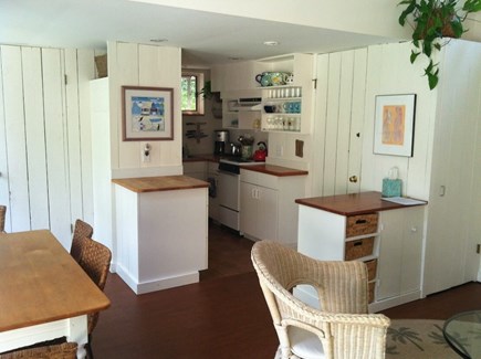 Wellfleet Cape Cod vacation rental - Kitchen, dining area and corner of living room.