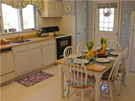 Chatham, Ridgevale Beach Cape Cod vacation rental - Fully equiped kitchen with dining area and door to deck