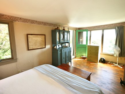 Ryder Beach Bayside, Truro Cape Cod vacation rental - Primary Bedroom and door to Sunroom